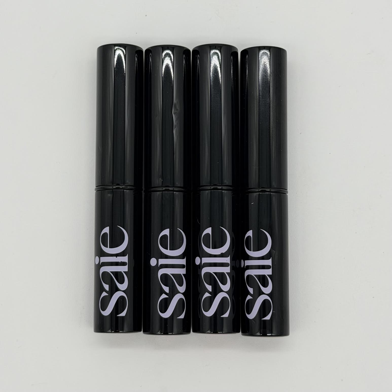 WHOLESALE SAIE LIP BLUR MATTE-BLURRING LIPSTICK 0.09 OZ UNBOXED PACKAGE #1 - ASSORTED COLORS - 48 PIECE LOT