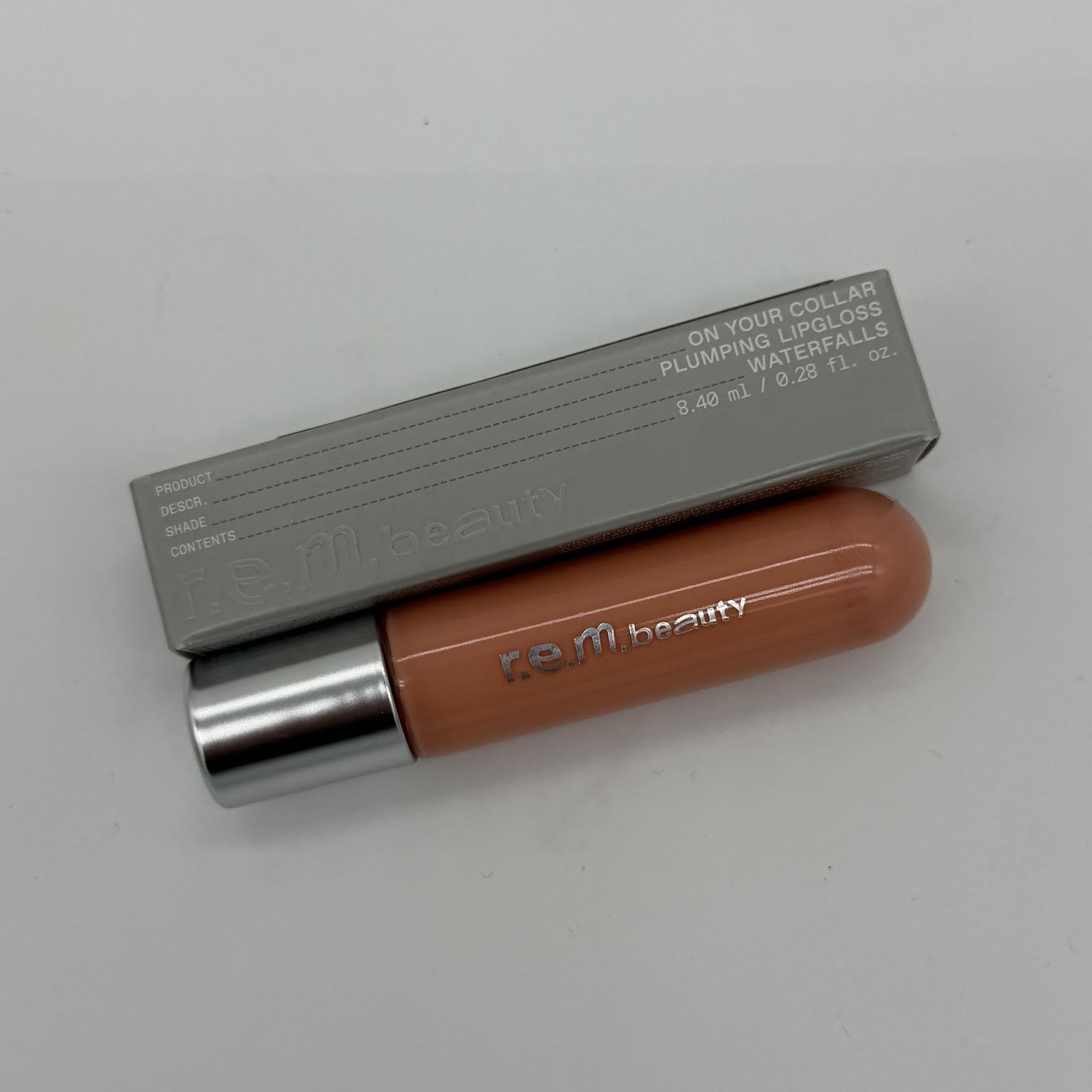 WHOLESALE R.E.M. BEAUTY ON YOUR COLLAR PLUMPING LIP GLOSS 0.28 OZ - WATERFALLS - 42 PIECE LOT