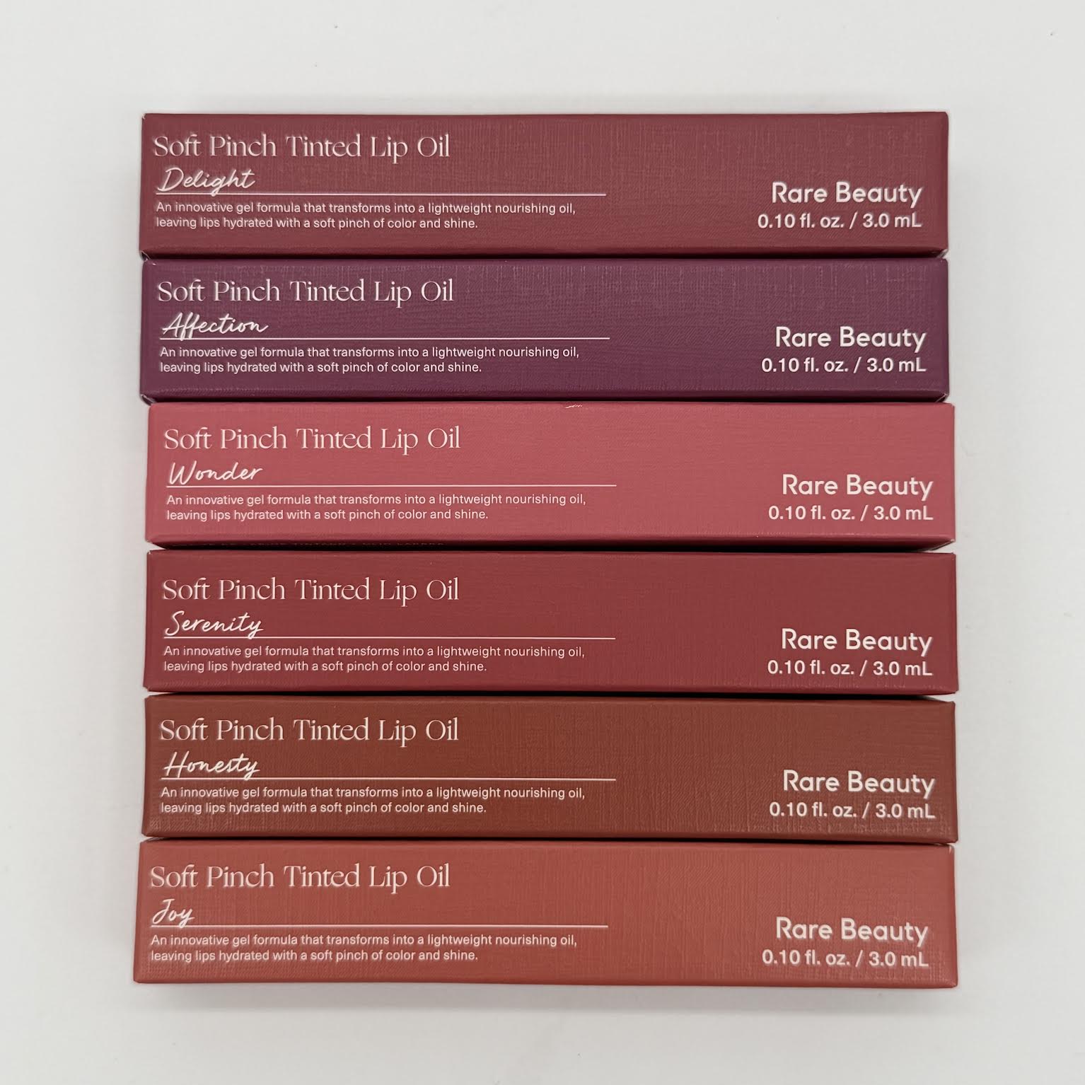 WHOLESALE RARE BEAUTY SOFT PINCH TINTED LIP OIL PACKAGE #7 - ASSORTED COLORS - 48 PIECE LOT