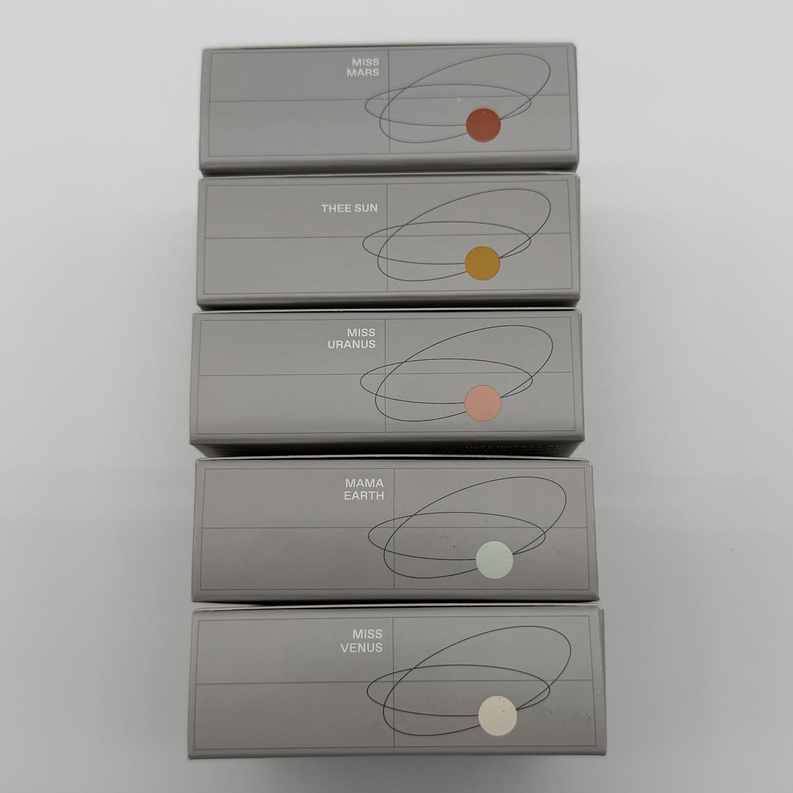 WHOLESALE R.E.M. BEAUTY INTERSTELLAR HIGHLIGHTER TOPPER PACKAGE #1 - ASSORTED COLORS - 50 PIECE LOT