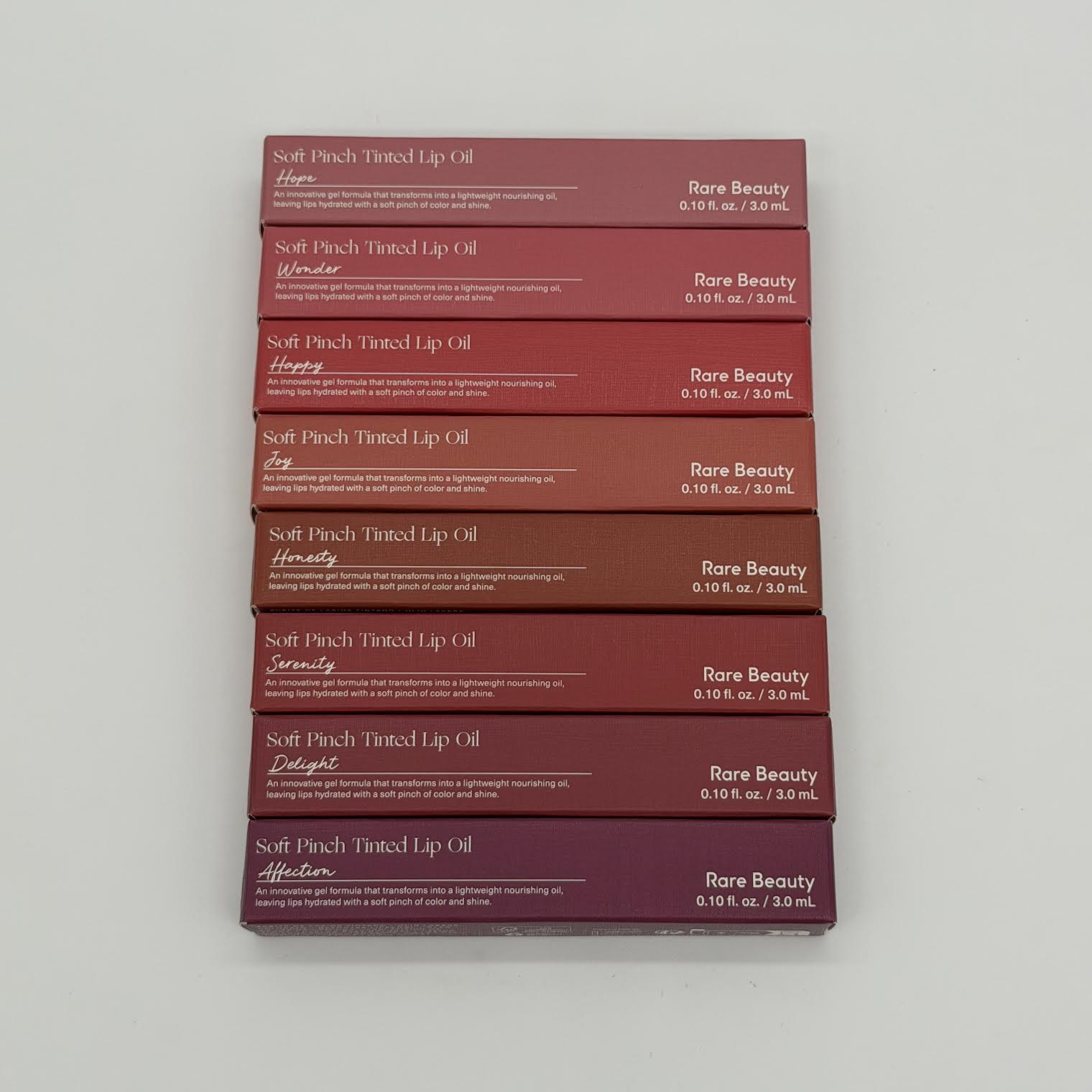 WHOLESALE RARE BEAUTY SOFT PINCH TINTED LIP OIL PACKAGE #6 - ASSORTED COLORS - 48 PIECE LOT