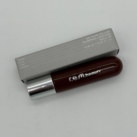 WHOLESALE R.E.M. BEAUTY ON YOUR COLLAR PLUMPING LIP GLOSS 0.28 OZ - ROLL-UP - 42 PIECE LOT