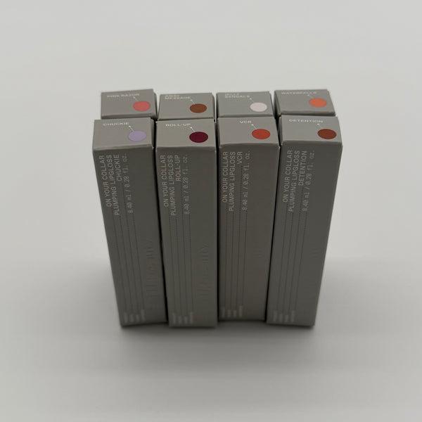 WHOLESALE R.E.M. BEAUTY ON YOUR COLLAR PLUMPING LIPGLOSS PACKAGE #1 - ASSORTED COLORS - 48 PIECE LOT